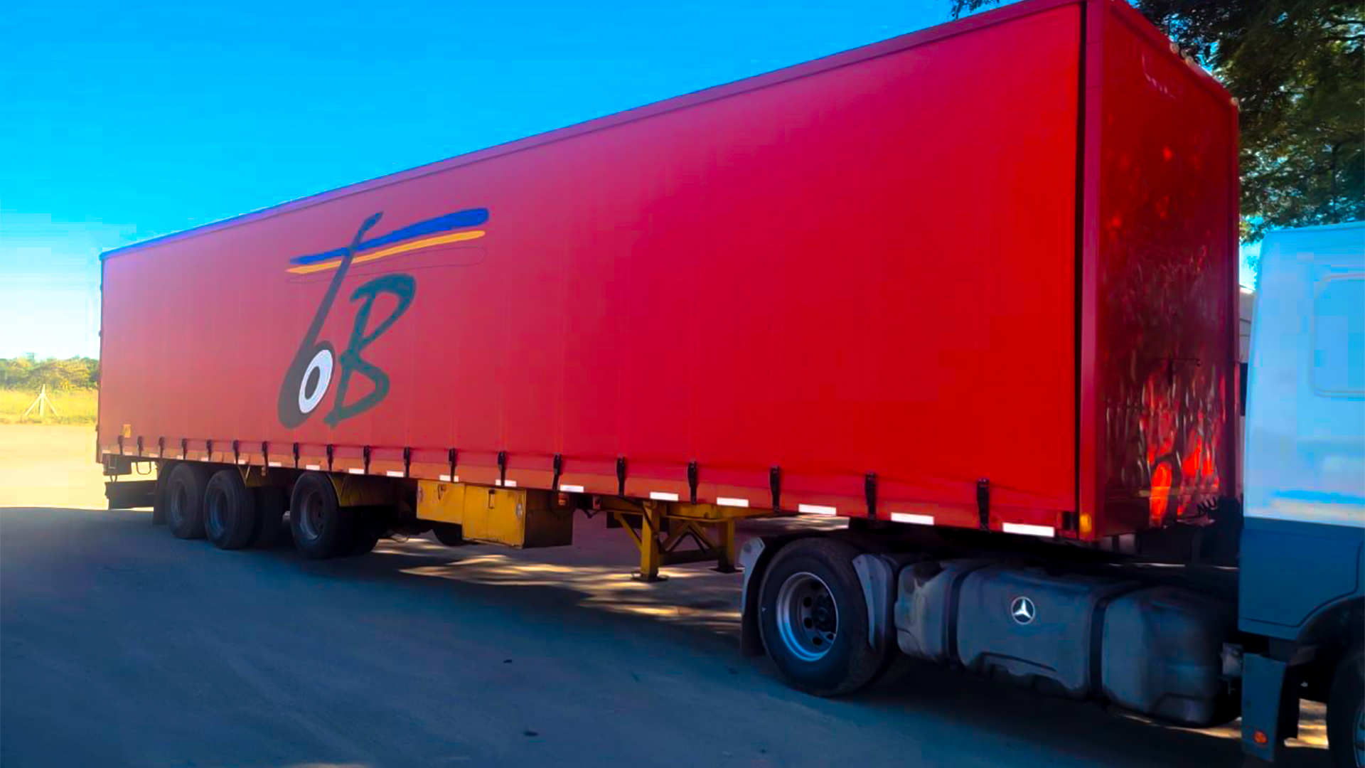 TRANSPORTE BELEN SRL LONA CON NUESTRA MARCA